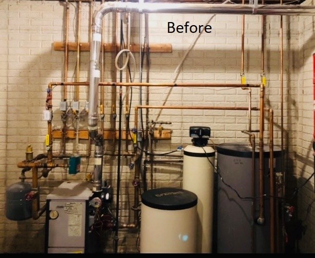 The outdated boiler system and piping before the makeover